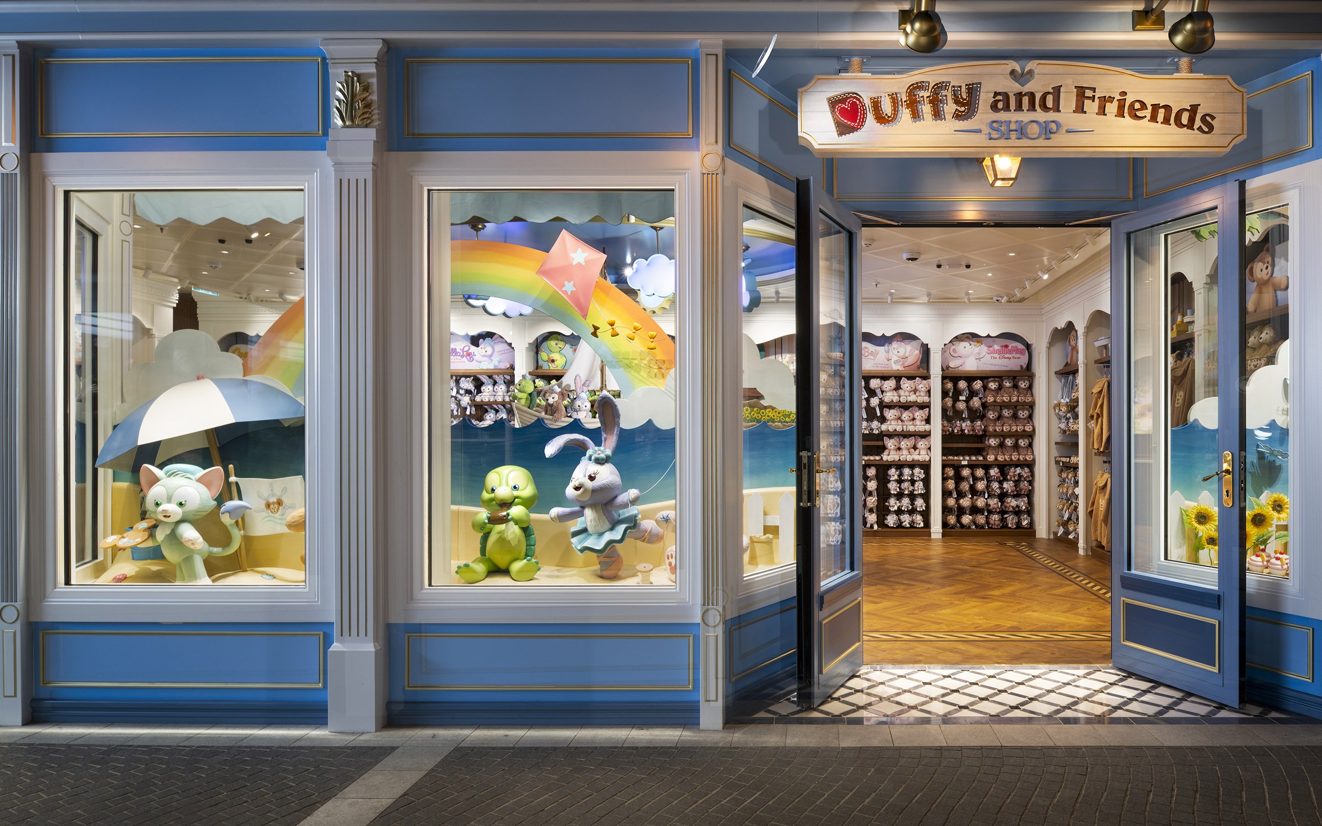Duffy and Friends Shop entrance on Disney Cruise Line with plush toys displayed.