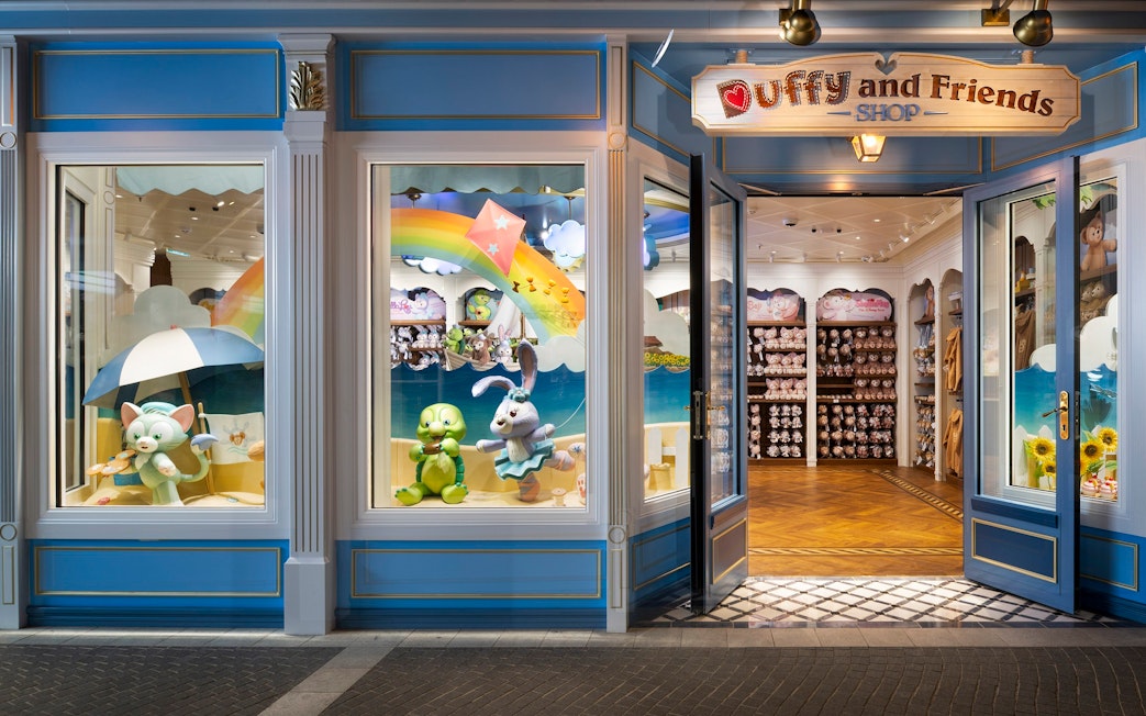 Duffy and Friends Shop entrance on Disney Cruise Line with plush toys displayed.
