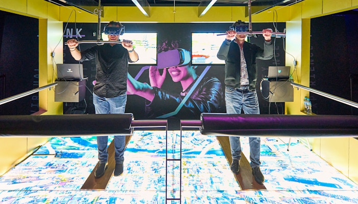 Visitors experiencing virtual reality at Melbourne Skydeck's Max VR Experience.