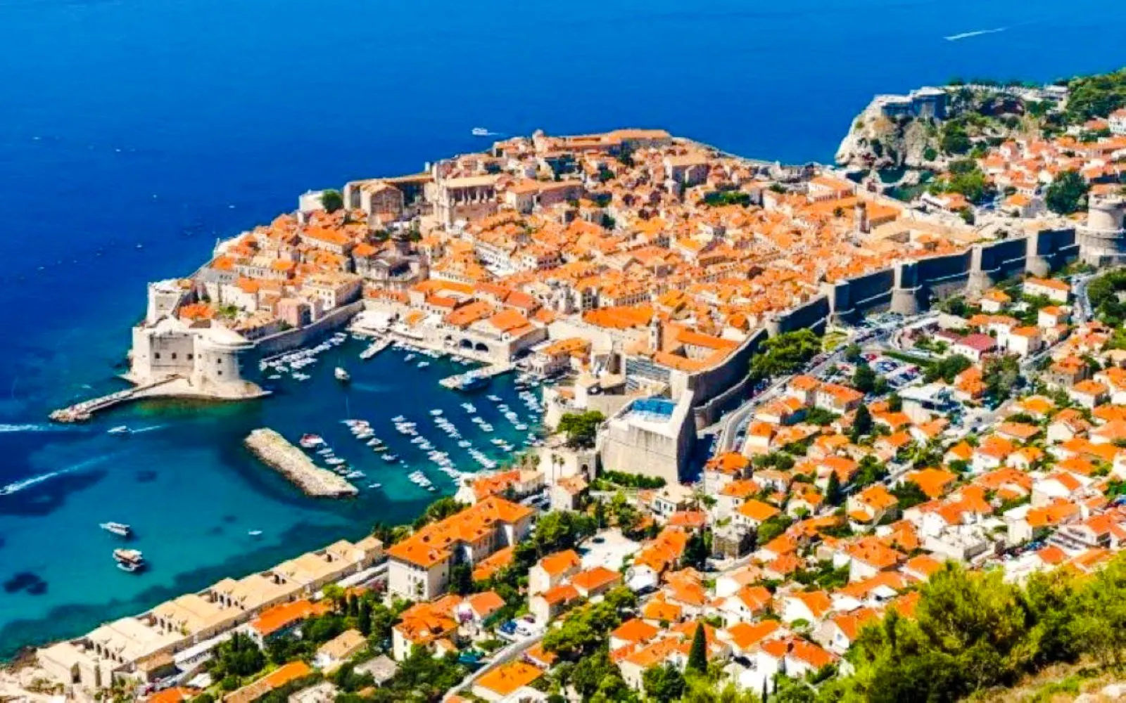 Aerial view of Dubrovnik old town with historic walls and Adriatic Sea.