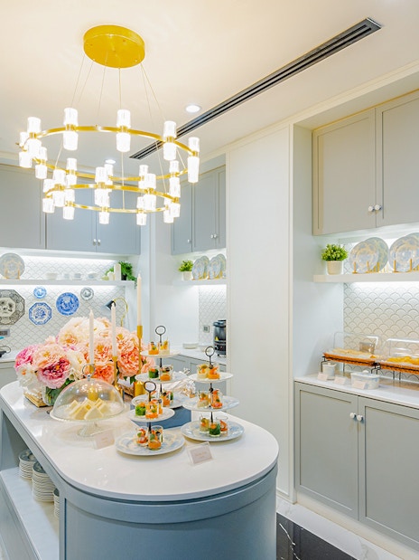 Coral Finest Business Class Lounge buffet area with elegant decor, Bangkok airport, Thailand.