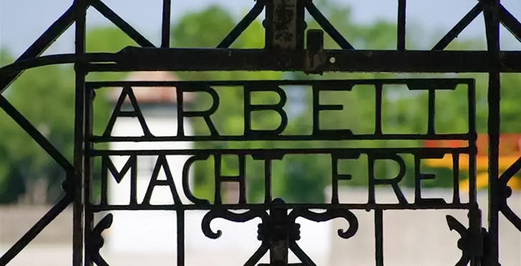 Dachau Concentration Camp entrance gate with "Arbeit Macht Frei" sign, Germany.