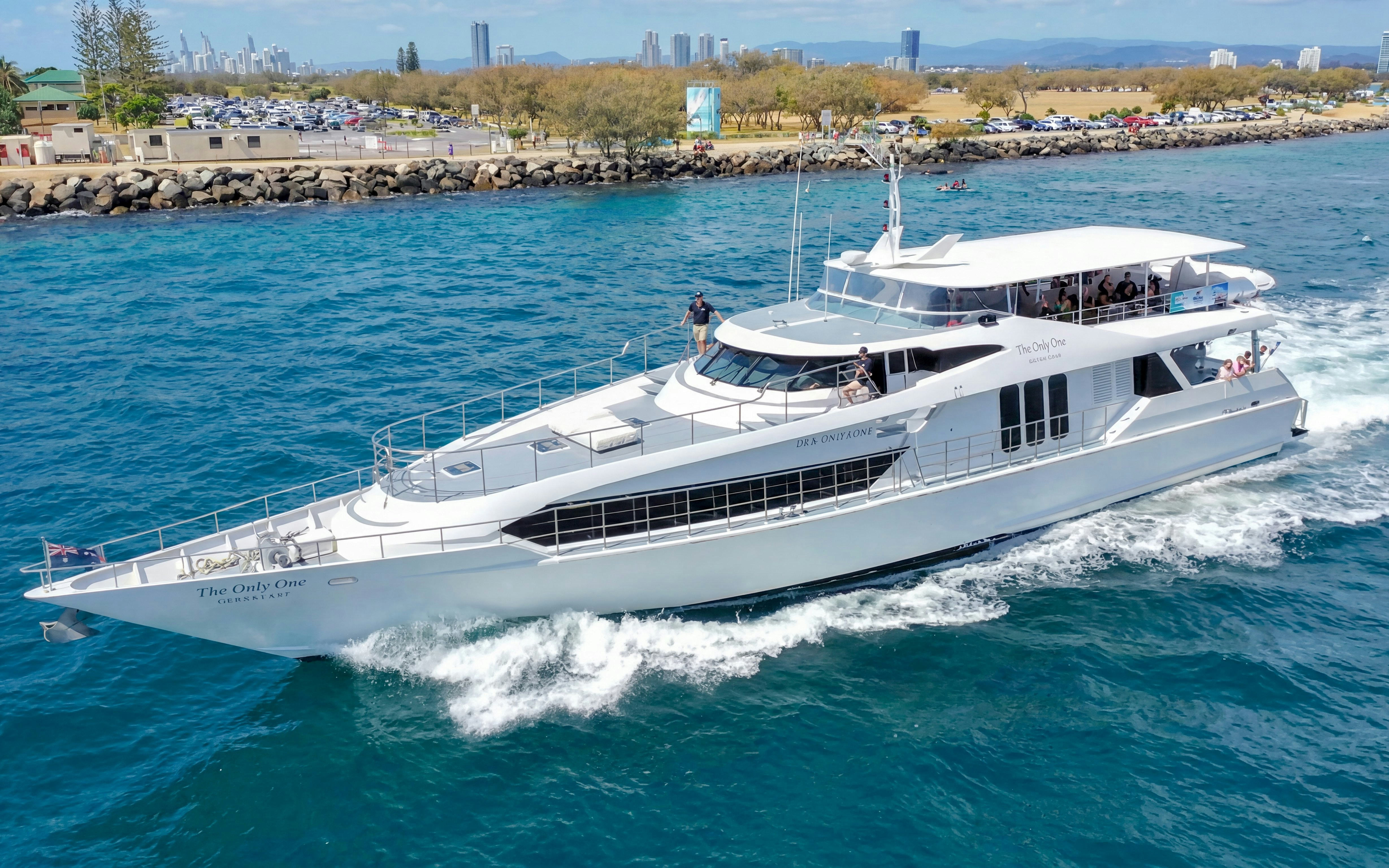 Luxury yacht cruising near Gold Coast for whale watching tour.