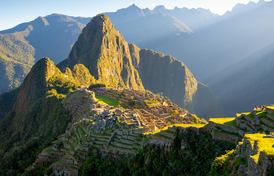 Machu Picchu ruins with Huayna Picchu mountain in the background, Peru.