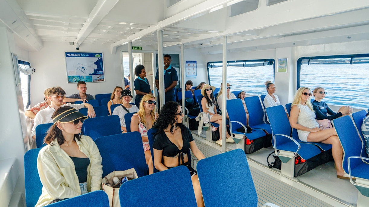 Guests enjoying the Ride and Slide Catamaran by South Sea Cats in Fiji.