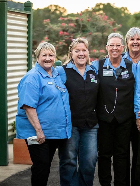 Mary Valley Rattler staff standing by the train in Gympie.