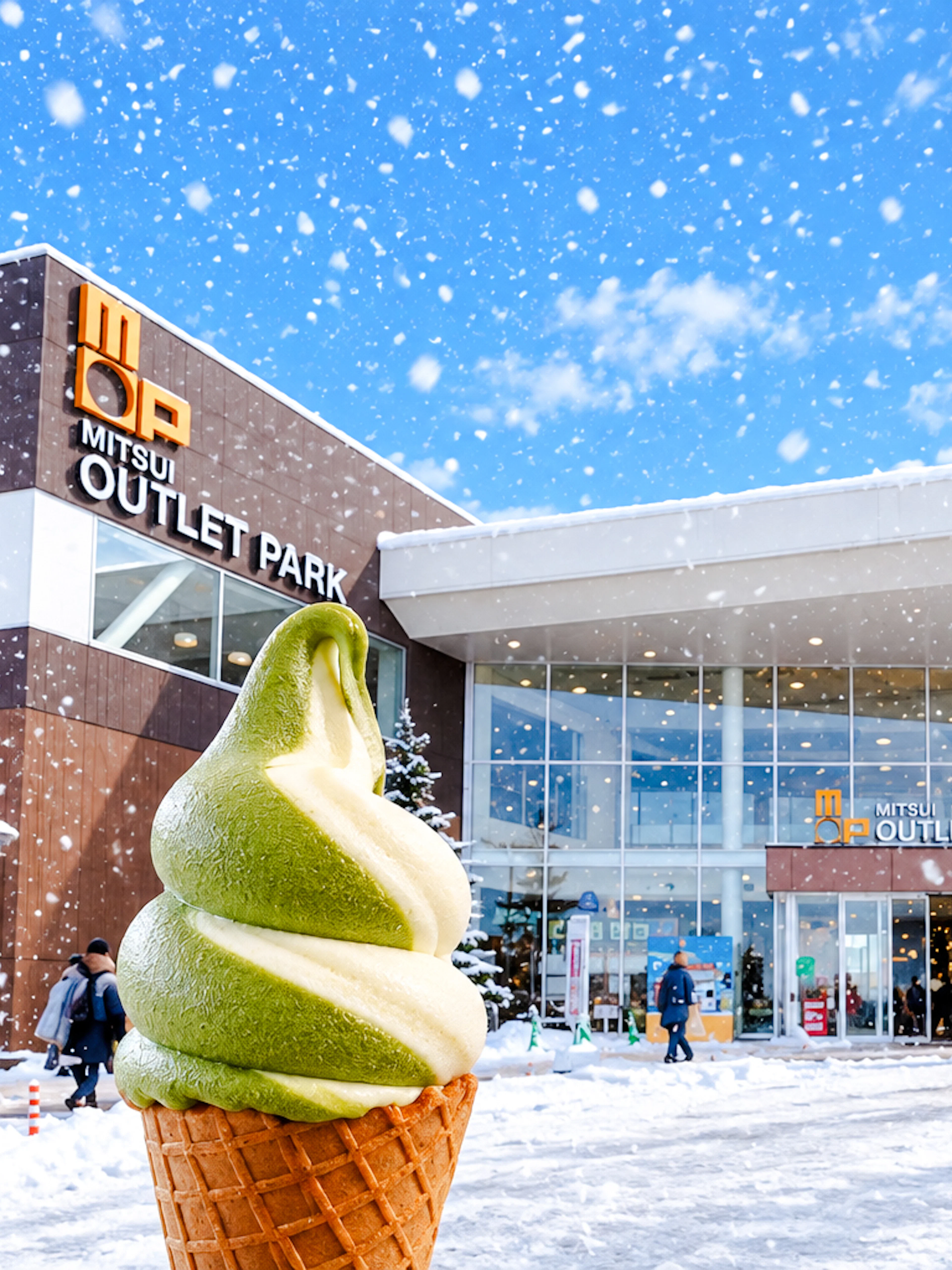 Mitsui Outlet Park in winter with matcha ice cream cone, Hokkaido tour.