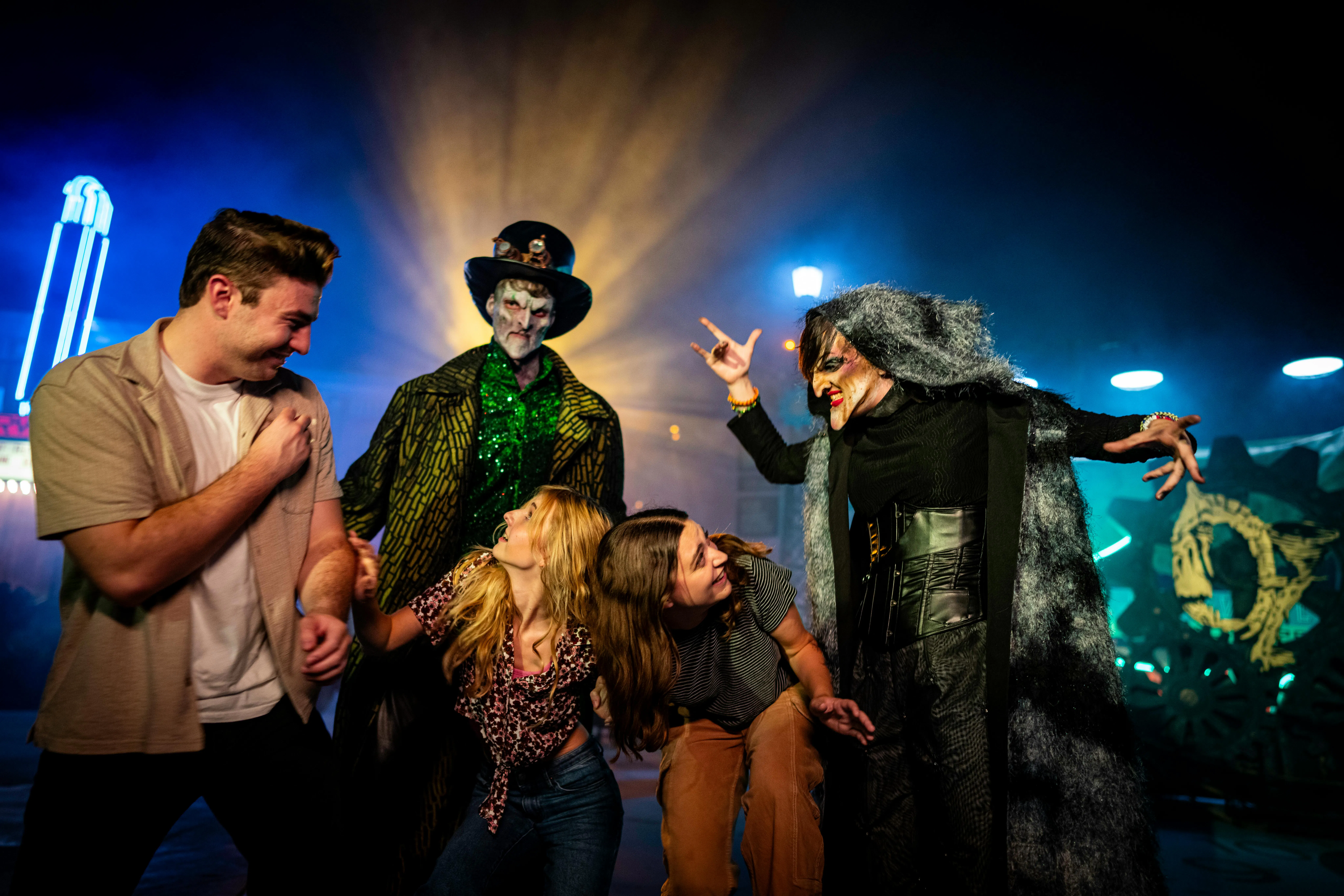 Visitors interacting with costumed performers at Canada's Wonderland Halloween Haunt.