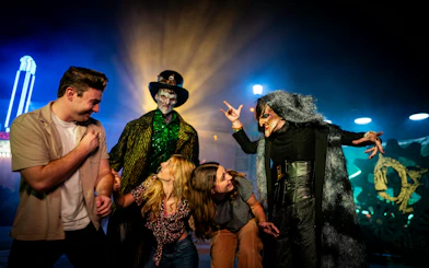 Visitors interacting with costumed performers at Canada's Wonderland Halloween Haunt.