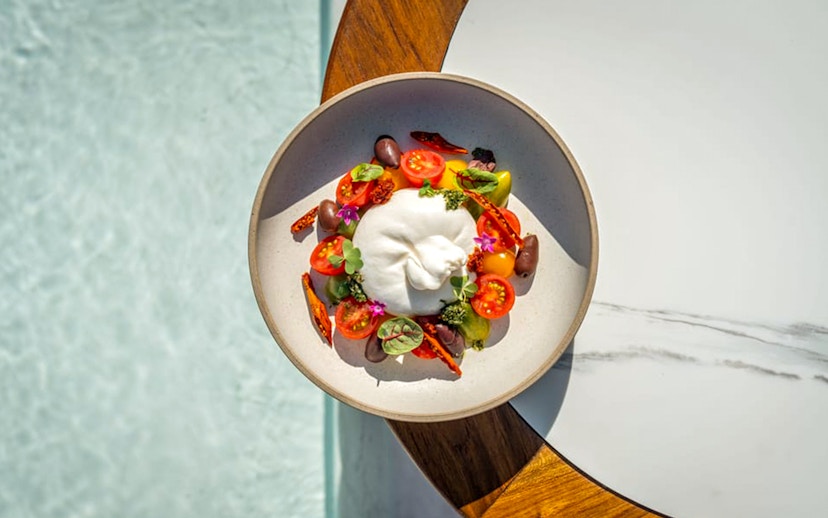 Burrata salad with cherry tomatoes and olives at Yona Beach Club, Phuket.