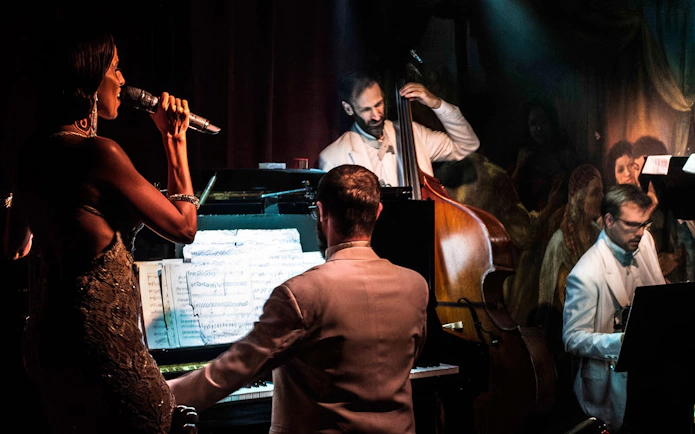 Rojo Tango Show musicians and singer performing live in Buenos Aires.