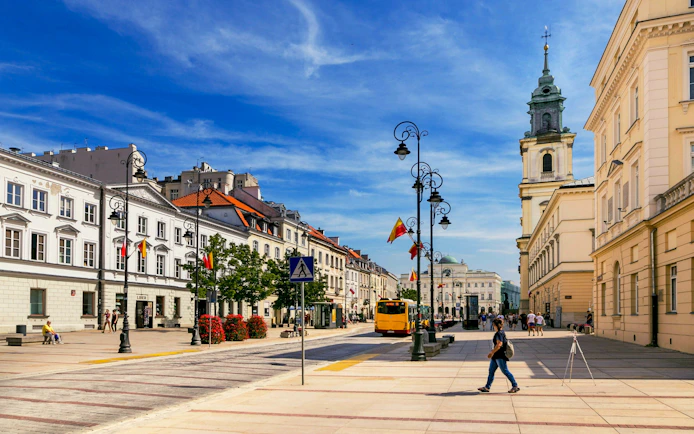 Street view of historic architecture and people in New World, Warsaw.