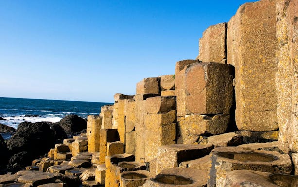 Giant's Causeway basalt columns by the sea in Northern Ireland.