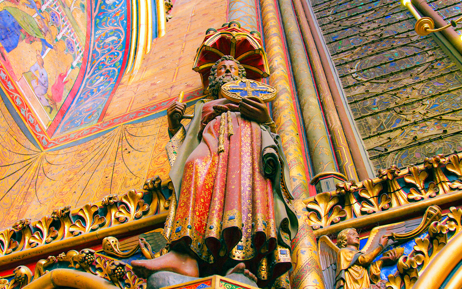 Upper Chapel interior with stained glass windows and 12 Apostle statues, Paris, France.