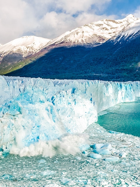 Perito Moreno Glacier with ice calving into turquoise water, Patagonia, Argentina.