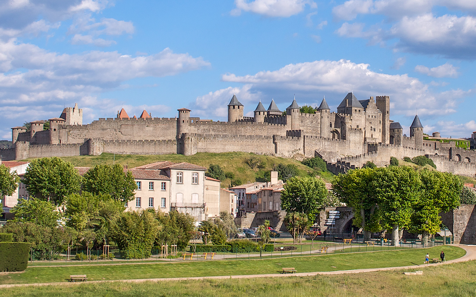 Cité de Carcassonne with Comtal Castle, view of medieval fortress walls and towers.