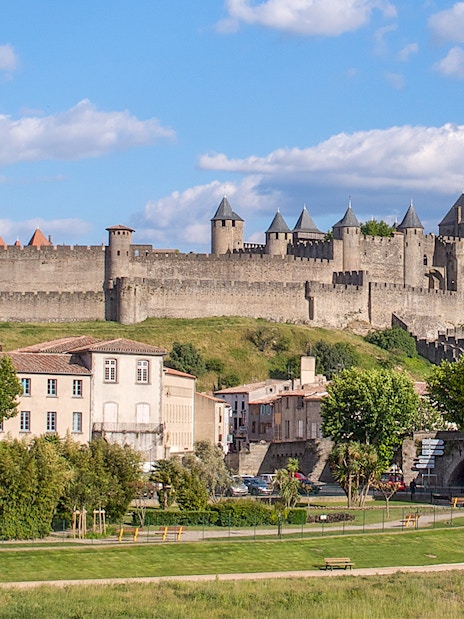 Cité de Carcassonne with Comtal Castle, view of medieval fortress walls and towers.