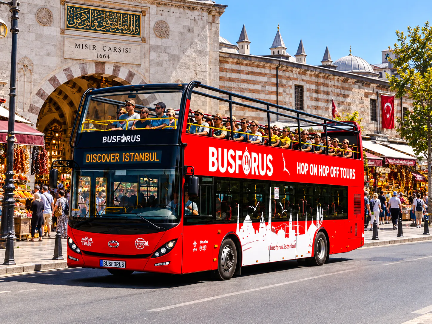 Open-top tour bus in front of Istanbul's Spice Bazaar, part of the 2-day Bosphorus cruise tour.