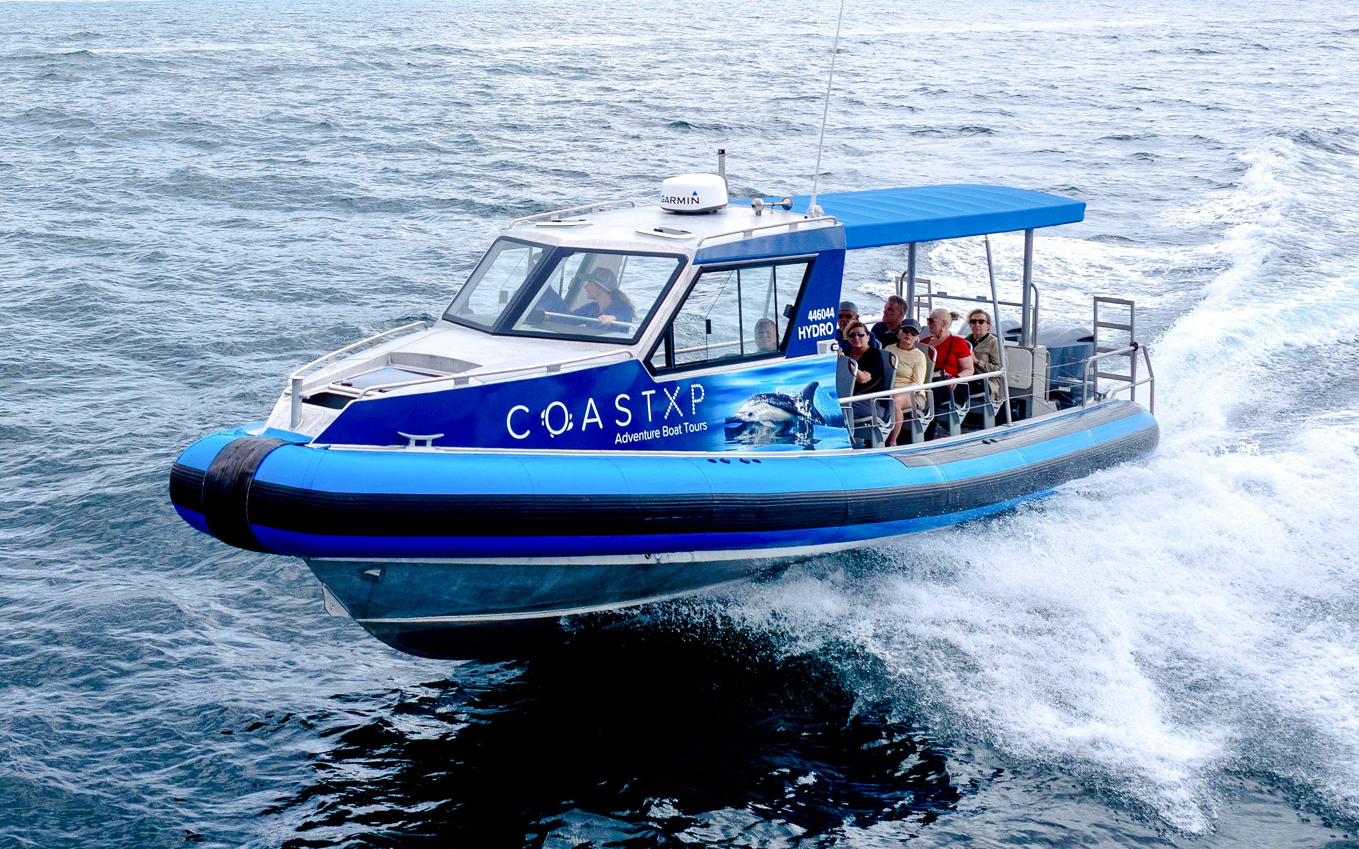 Boat with passengers on Lake Macquarie Coastal Tour.