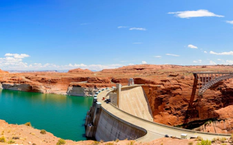 Hoover Dam with surrounding red rock formations and bridge near Las Vegas.