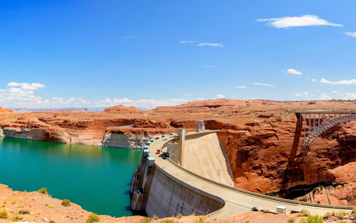 Hoover Dam with surrounding red rock formations and bridge near Las Vegas.