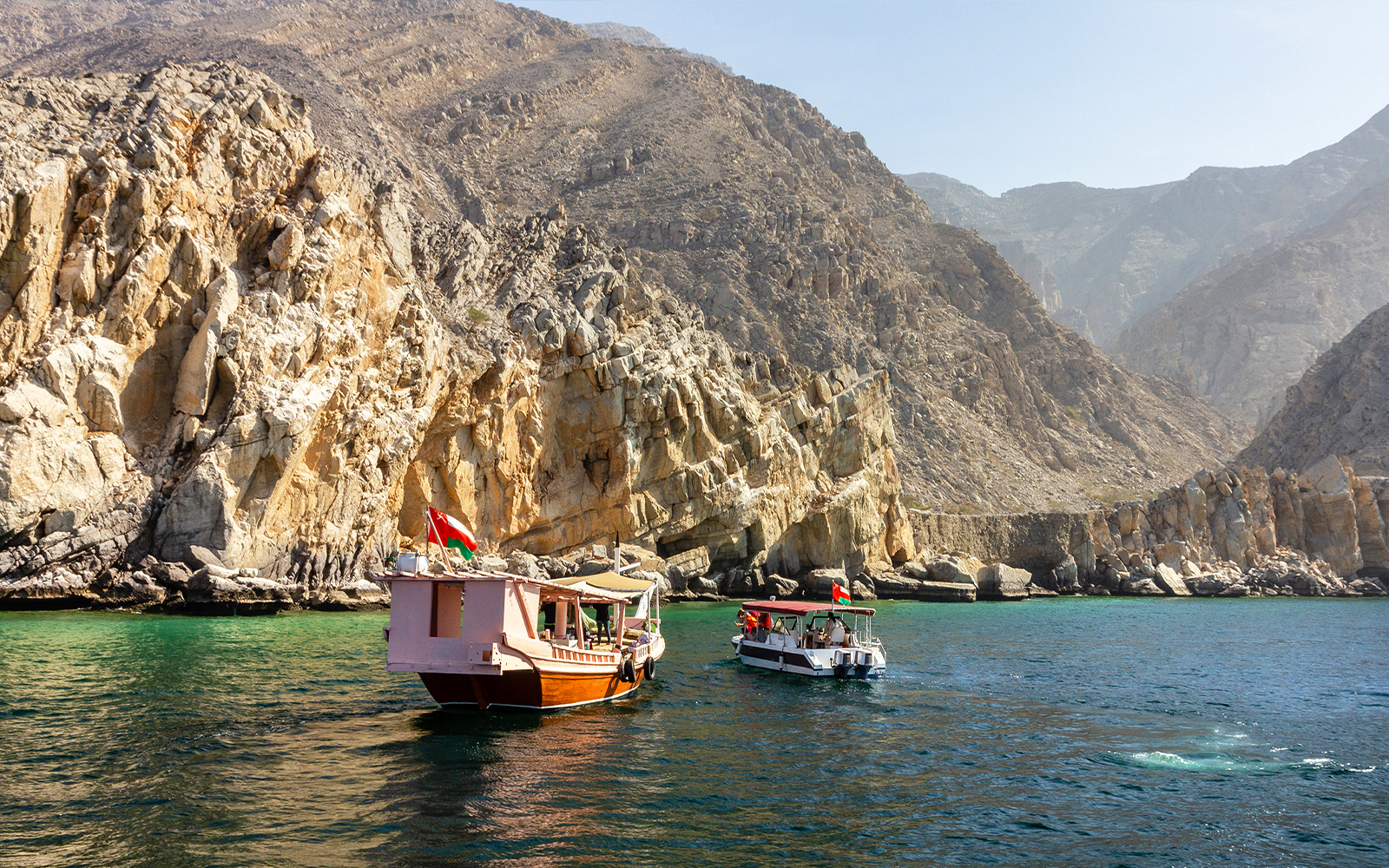 Tourists on dhow boat in Khasab, Oman