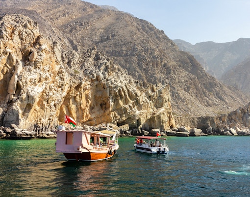 Tourists on dhow boat in Khasab, Oman