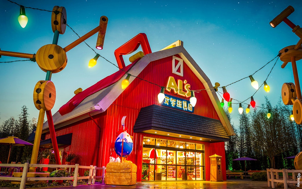 Al's Toy Barn facade with colorful lights at Shanghai Disney.
