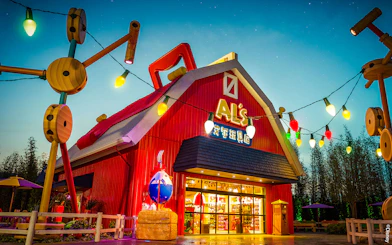 Al's Toy Barn facade with colorful lights at Shanghai Disney.
