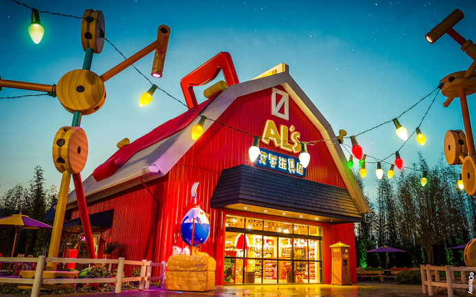 Al's Toy Barn facade with colorful lights at Shanghai Disney.
