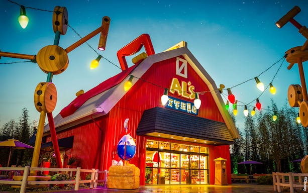 Al's Toy Barn facade with colorful lights at Shanghai Disney.