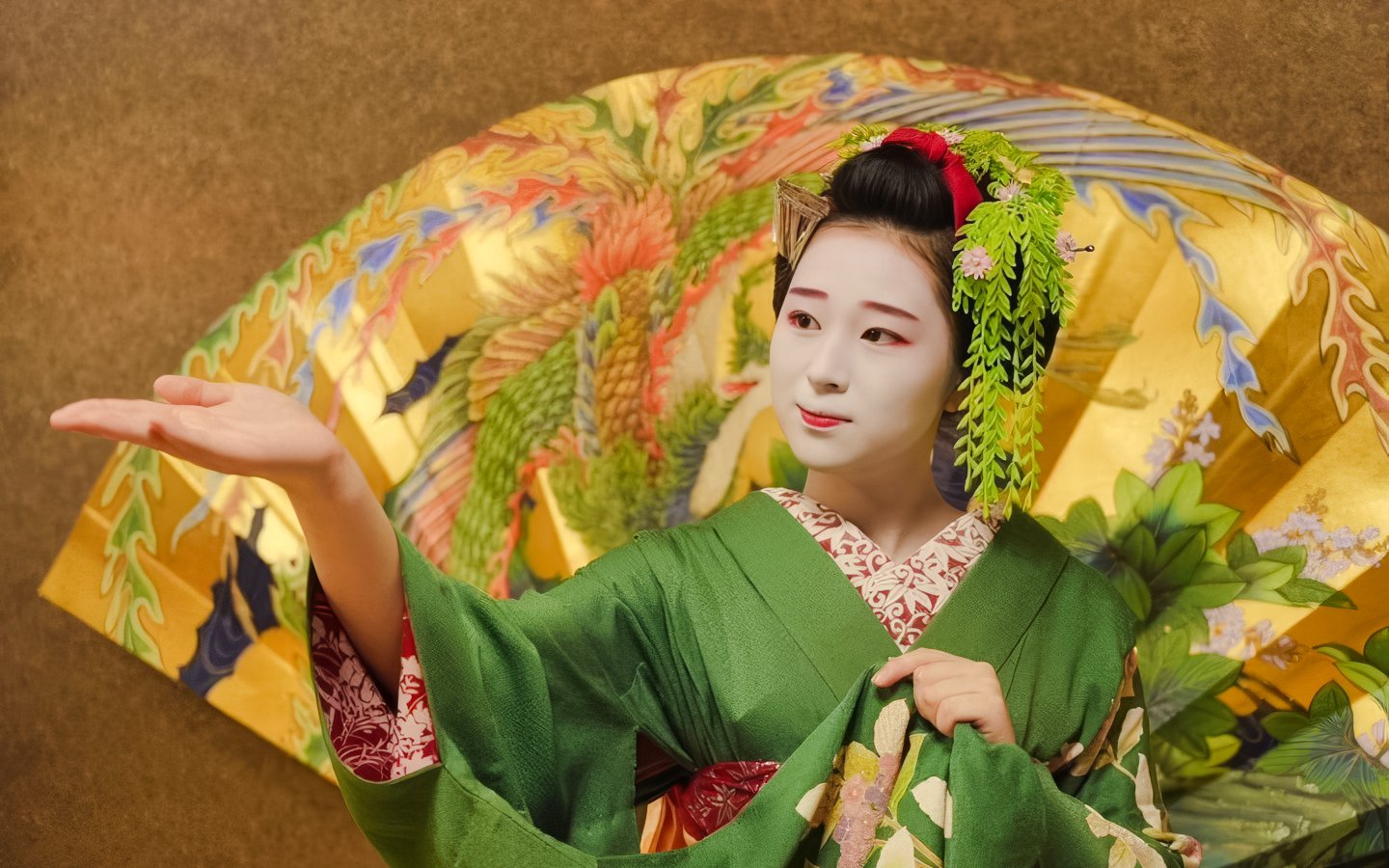 Geisha in traditional green kimono performing with ornate umbrella in Japan.