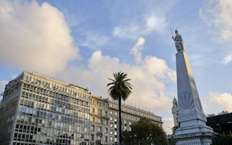 Obelisk and historic buildings on Avenida de Mayo, Buenos Aires.