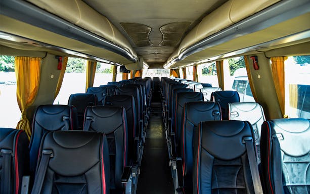 Bus interior for Tirana Airport transfer to Tirana Central.