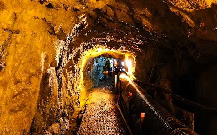 Underground tunnel in the DMZ with visitors exploring the passage.