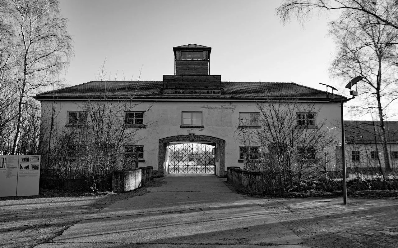 Entrance gate of Dachau Memorial Site on a guided day trip from Munich.
