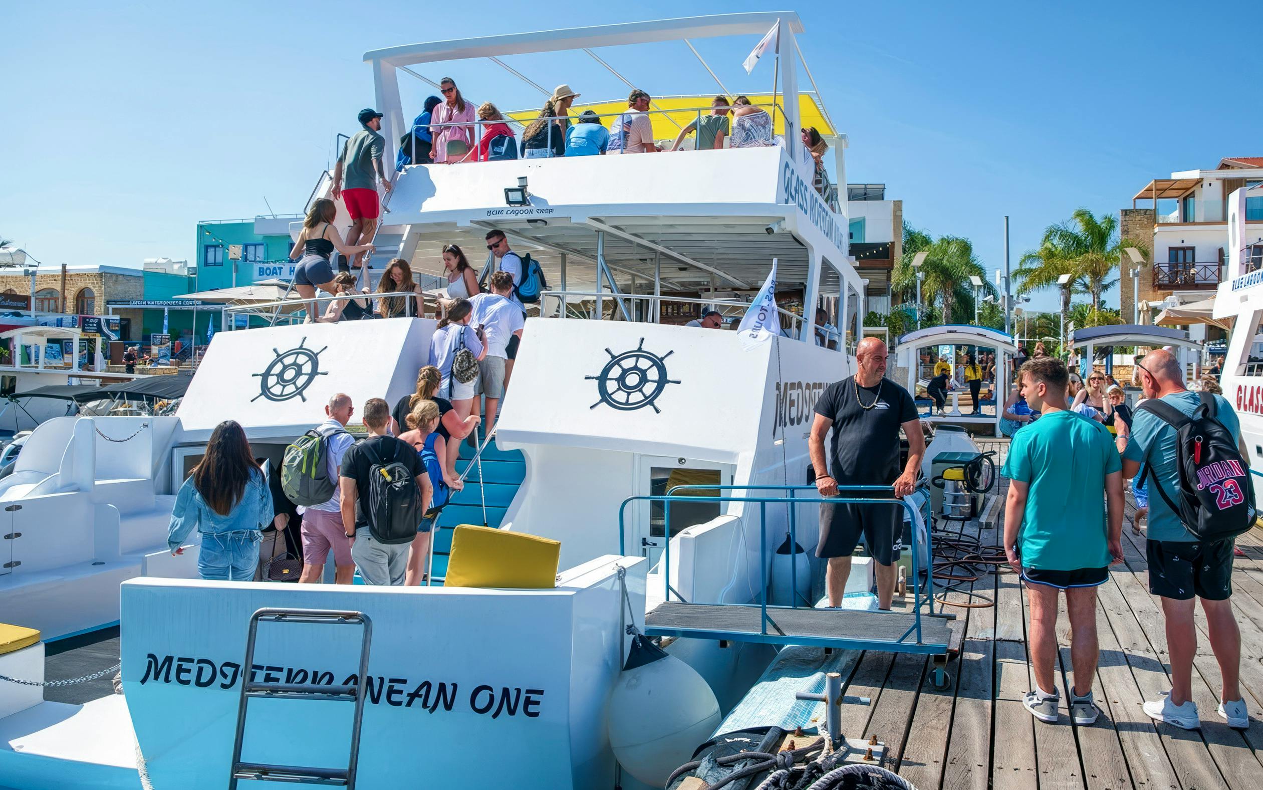Tourists boarding the Mediterranean One for a Blue Lagoon cruise from Latchi.