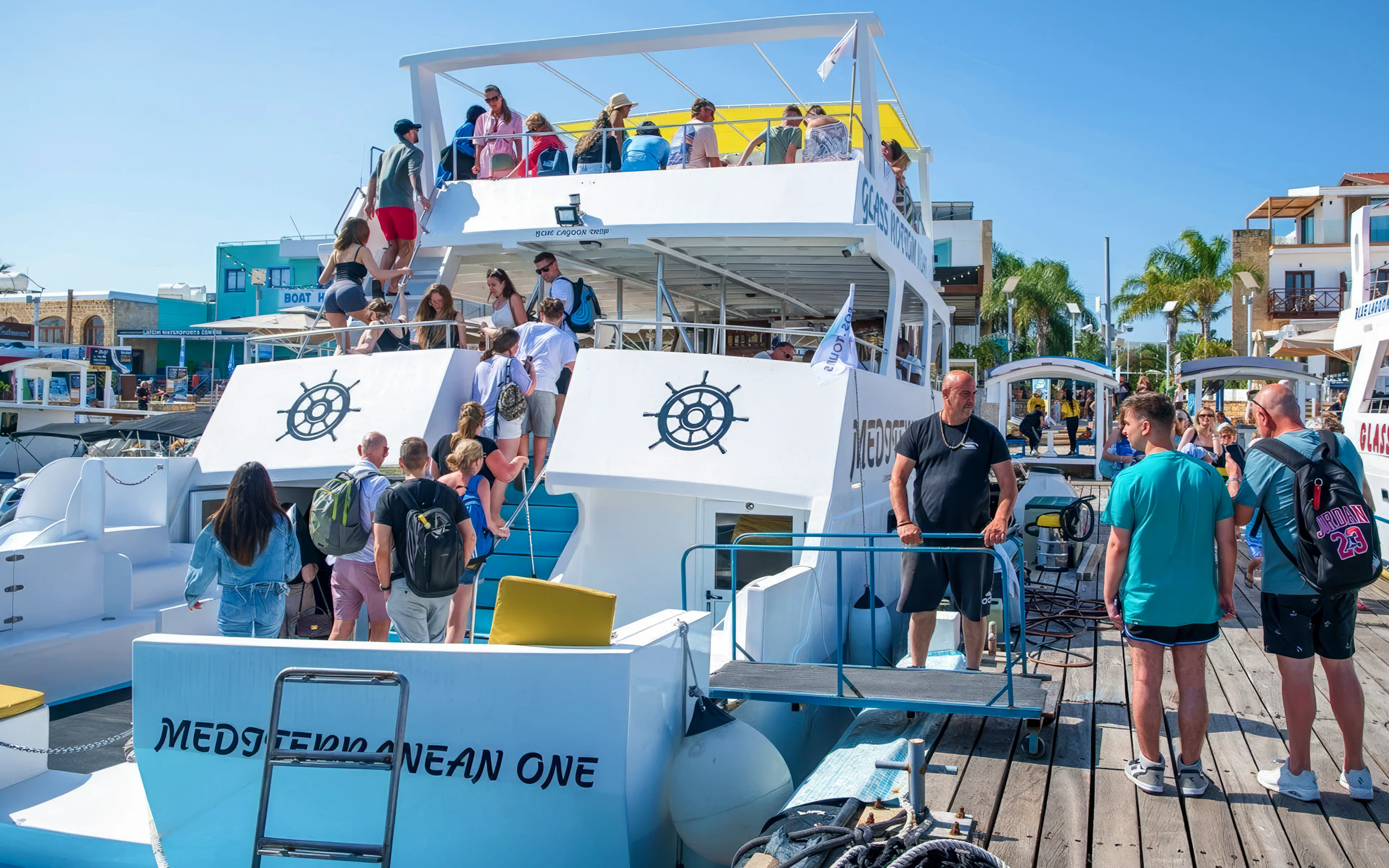 Tourists boarding the Mediterranean One for a Blue Lagoon cruise from Latchi.