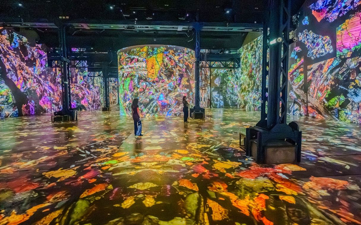 Immersive digital art display at The Moonwalkers Exhibition, Atelier des Lumières, Paris.