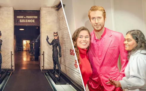 Le Grand Rex tour entrance with Catwoman figures and visitors posing with a wax figure.
