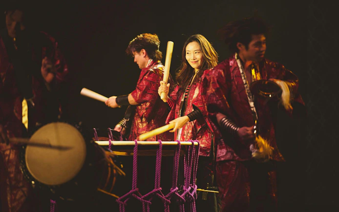 Performers playing traditional drums at DRUM TAO Theater in Kyoto.