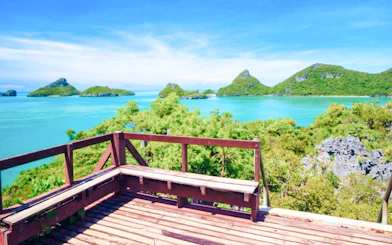 Wooden deck overlooking Ang Thong Marine Park islands and turquoise sea, Koh Samui.