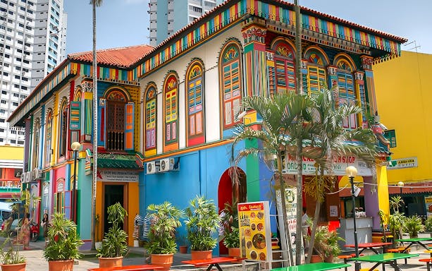 Colorful building on Little India Hawker Street, Singapore, part of guided food tasting tour.