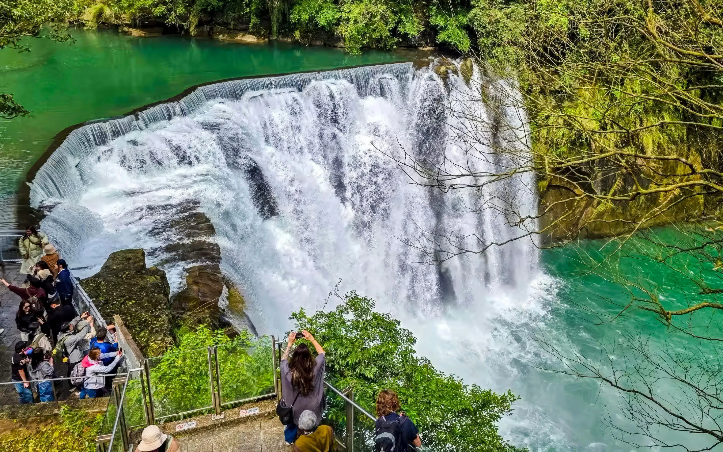 Shifen Waterfall cascading into turquoise pool, Pingxi District, New Taipei City, Taiwan.