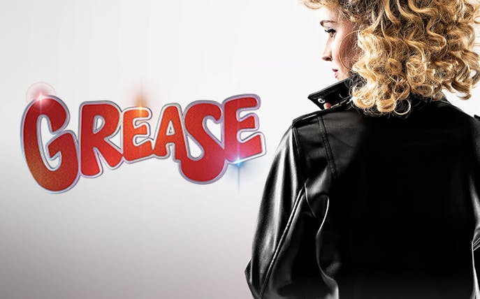 Grease logo with person in leather jacket and curly hair