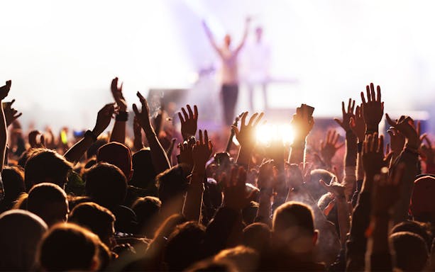 Crowd enjoying a live performance at Terra Solis by Tomorrowland.