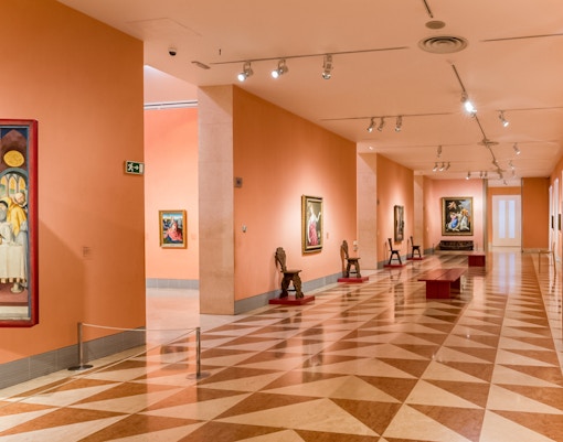 Thyssen Bornemisza Museum gallery room with paintings on display in Madrid.