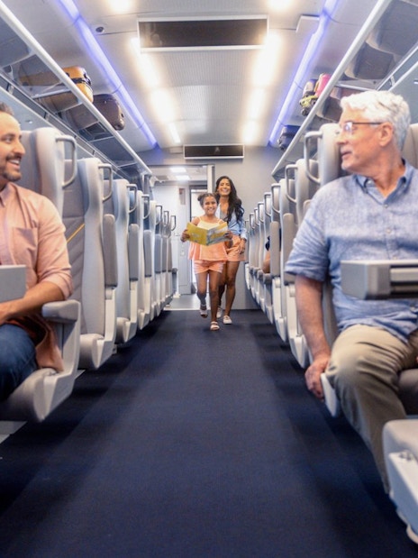 Passengers seated inside the Brightline train from Miami to Orlando.