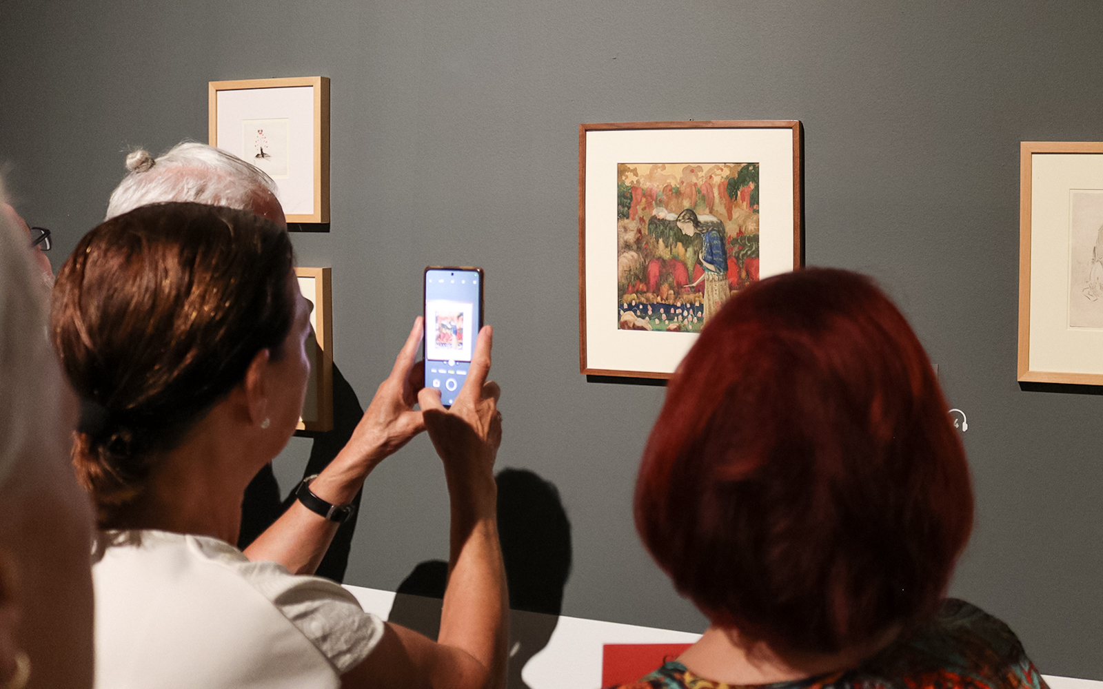 Visitors viewing artwork at the Russian Museum, St. Petersburg.