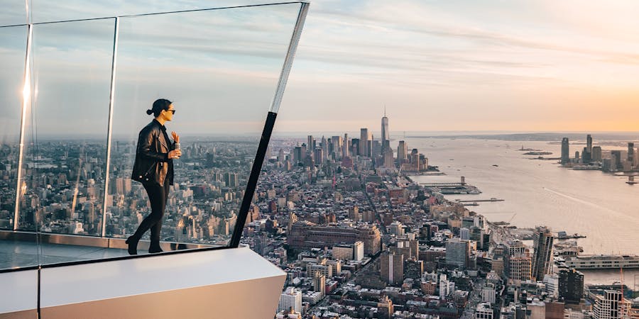 a woman at the EDGE observatory in NYC